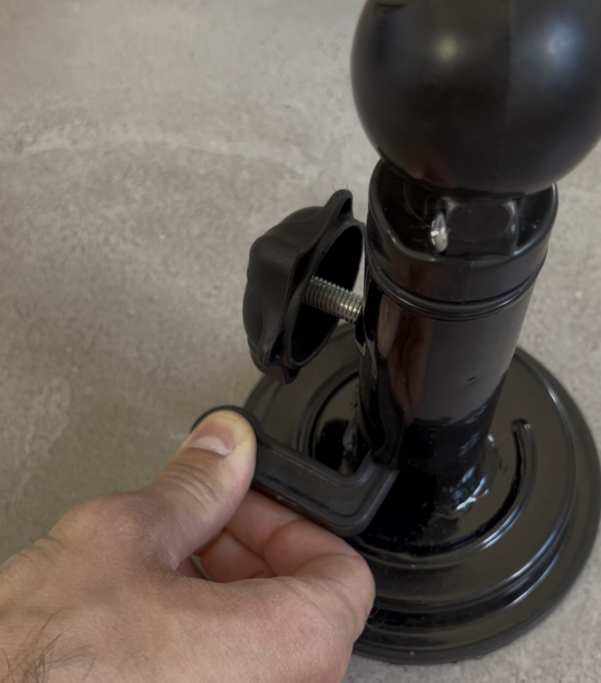 Pressing the Kickpal suction base down onto the floor